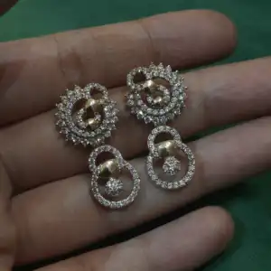 Twirl Diamond Dangler Earrings in 925 Silver with Rose Gold Plating and Zircon